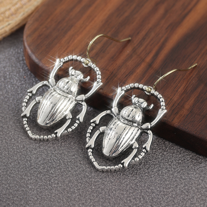 Handcrafted Brass Art Deco Drop Earrings with Scarab Detailing